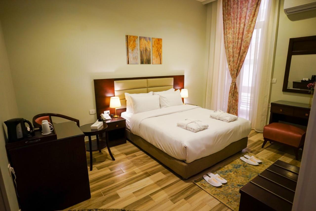 Savoy Hotel Elminya Экстерьер фото