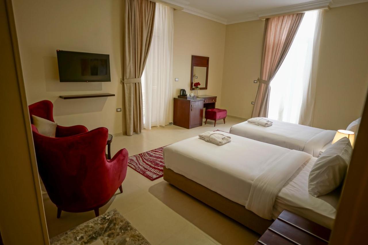 Savoy Hotel Elminya Экстерьер фото