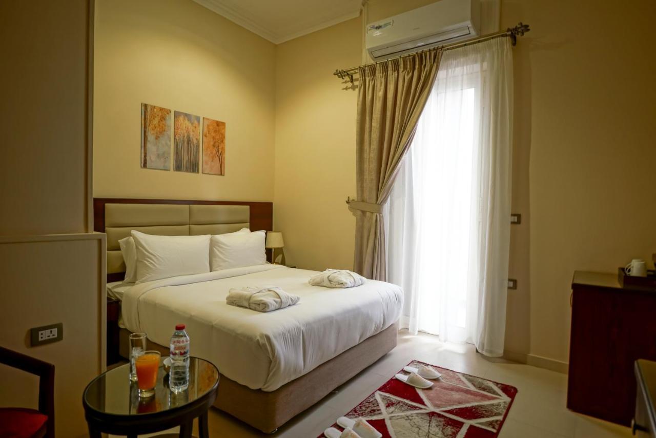 Savoy Hotel Elminya Экстерьер фото