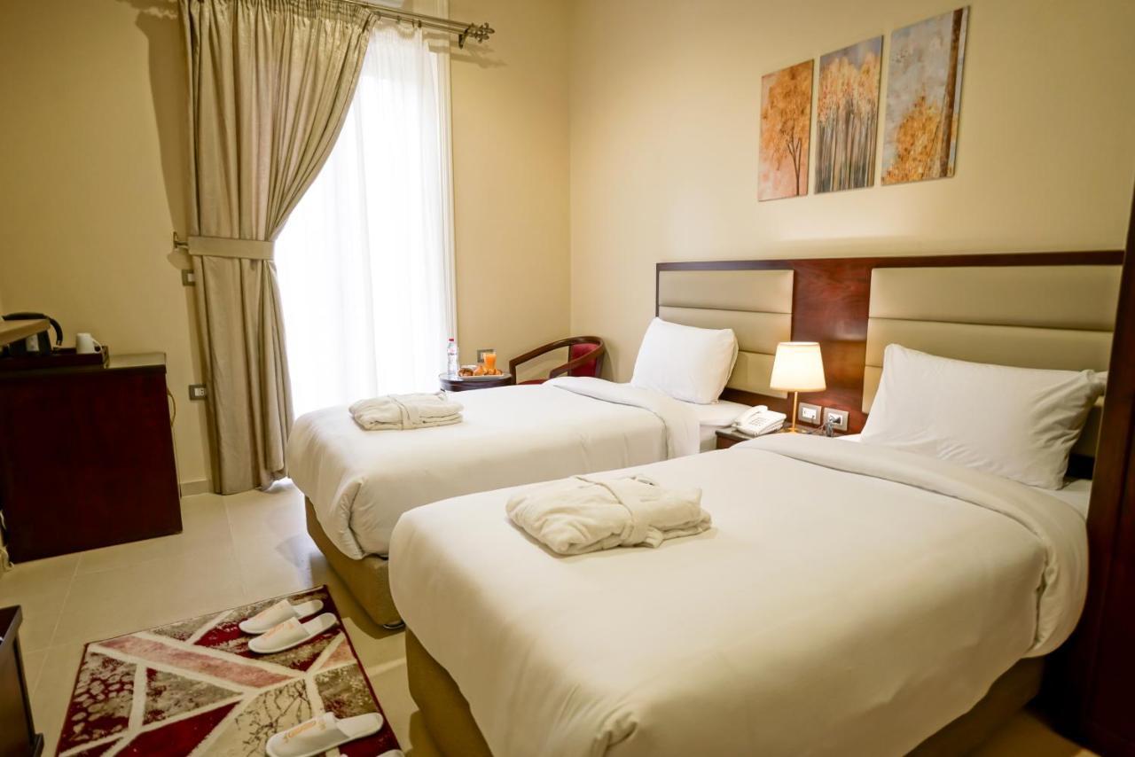 Savoy Hotel Elminya Экстерьер фото