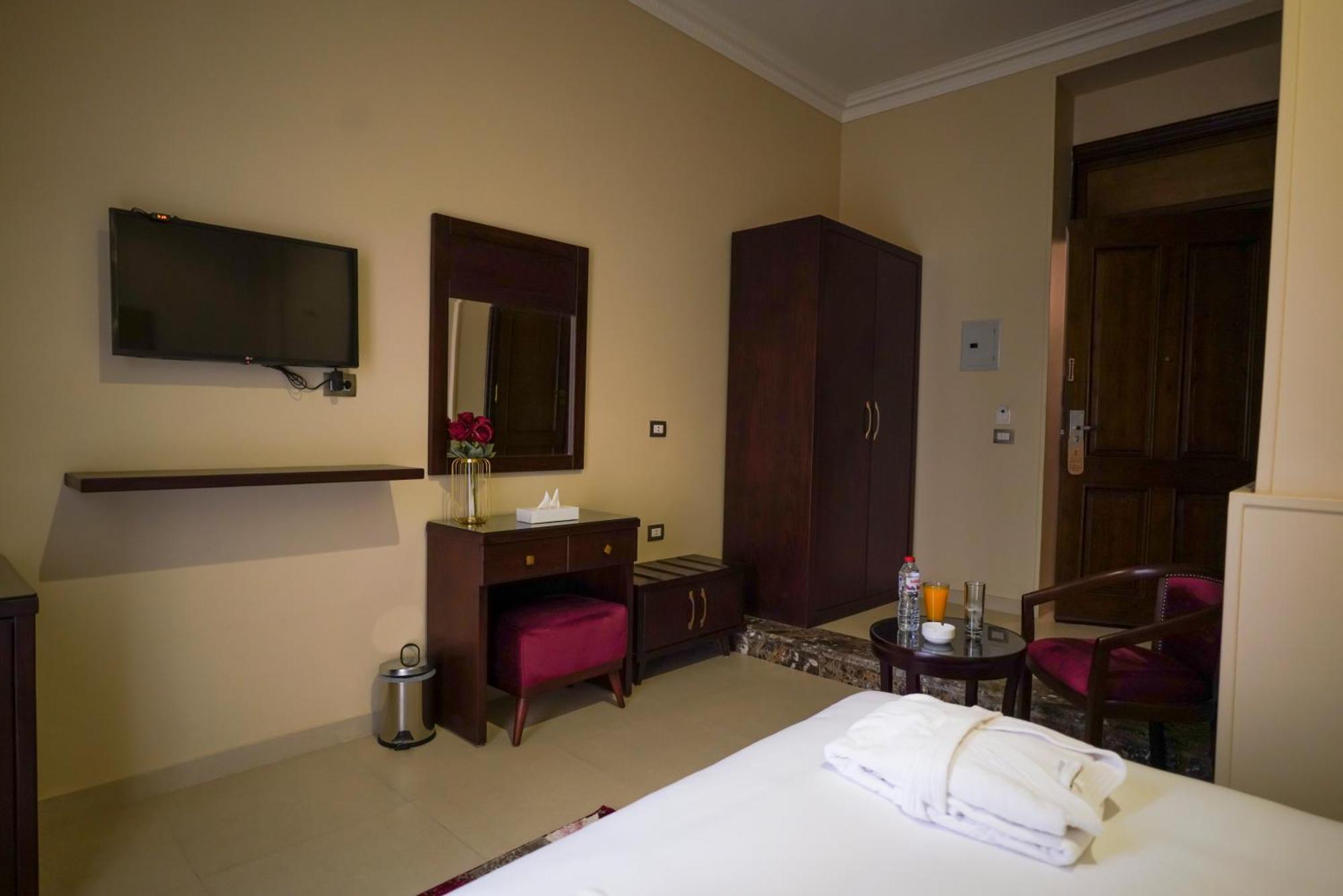 Savoy Hotel Elminya Номер фото