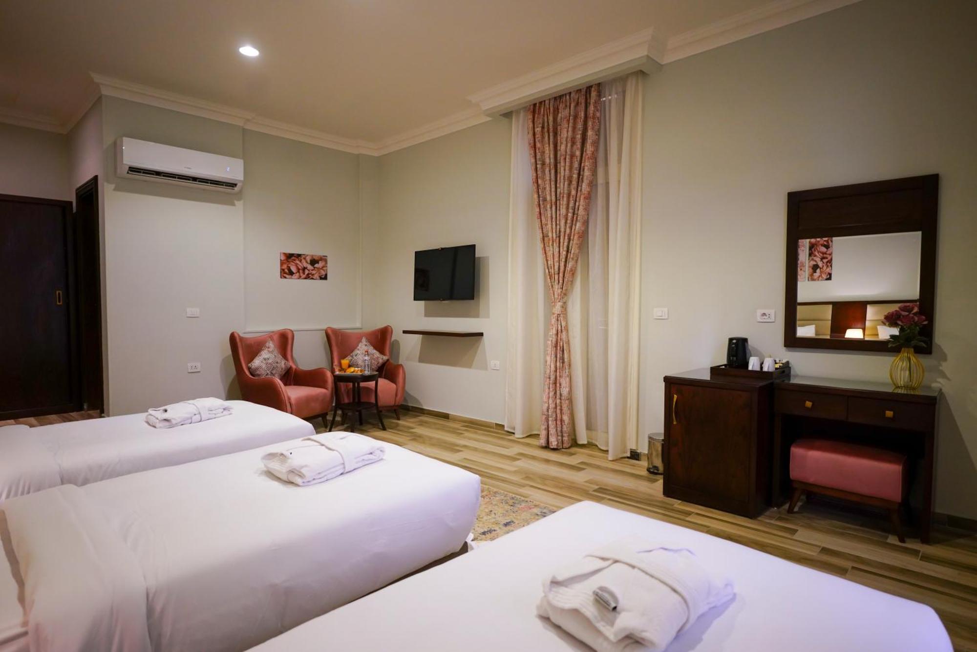Savoy Hotel Elminya Номер фото