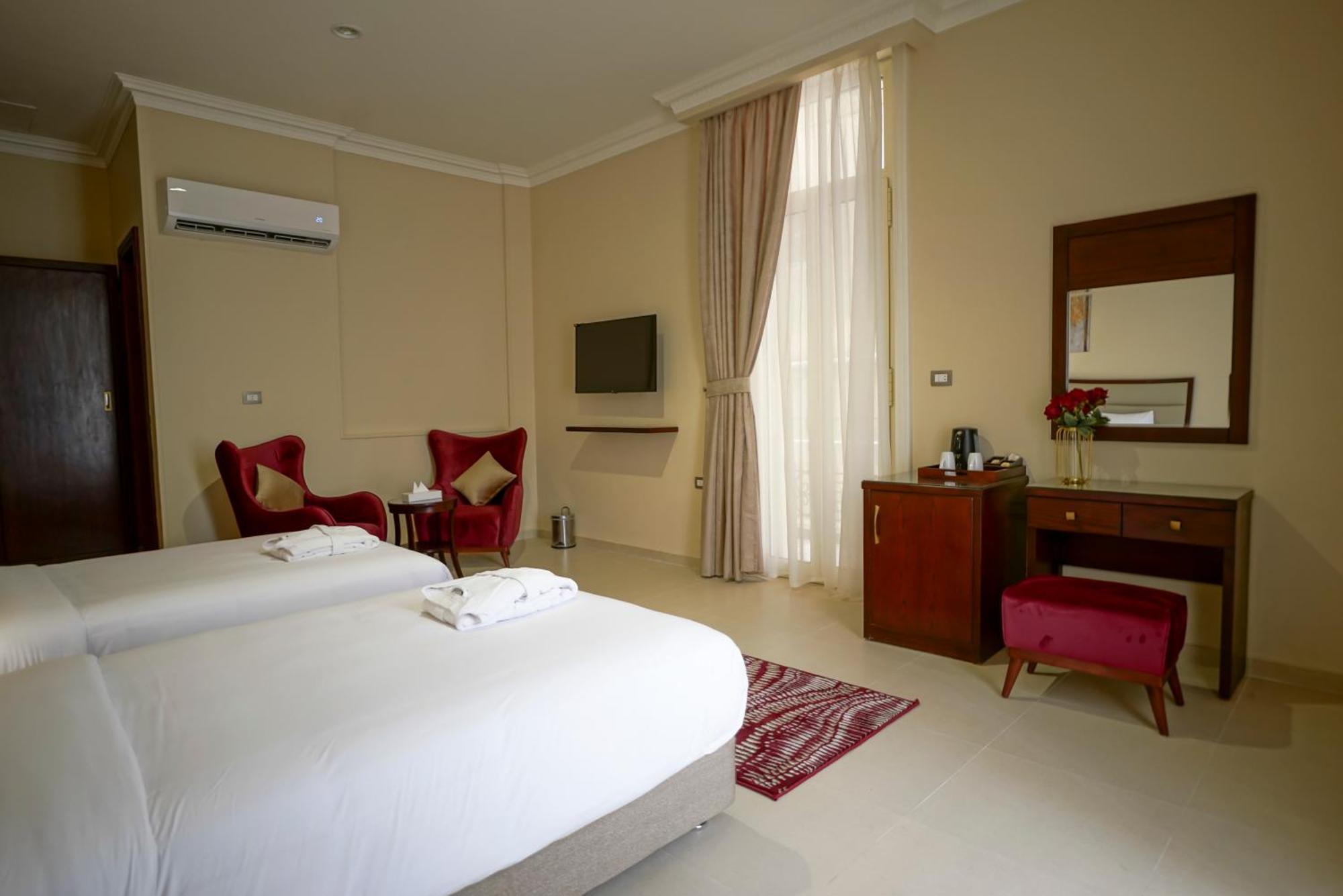 Savoy Hotel Elminya Номер фото